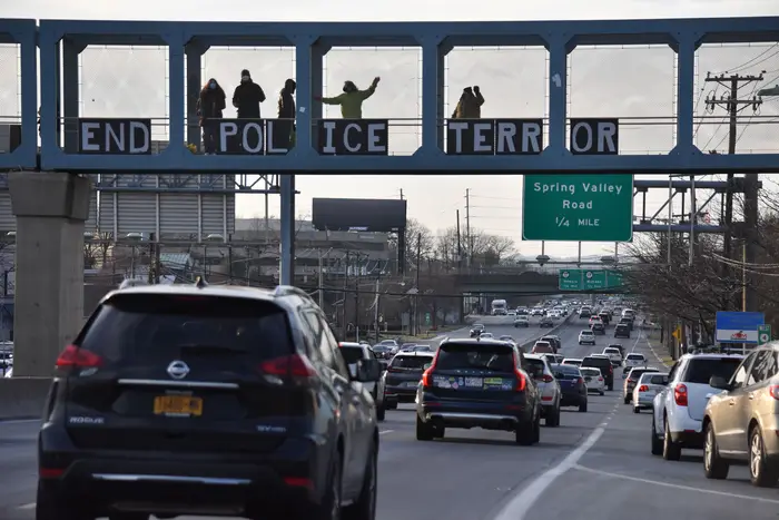 Activists gather on a highway overpass in Paramus, N.J., calling for justice for Tyre Nichols